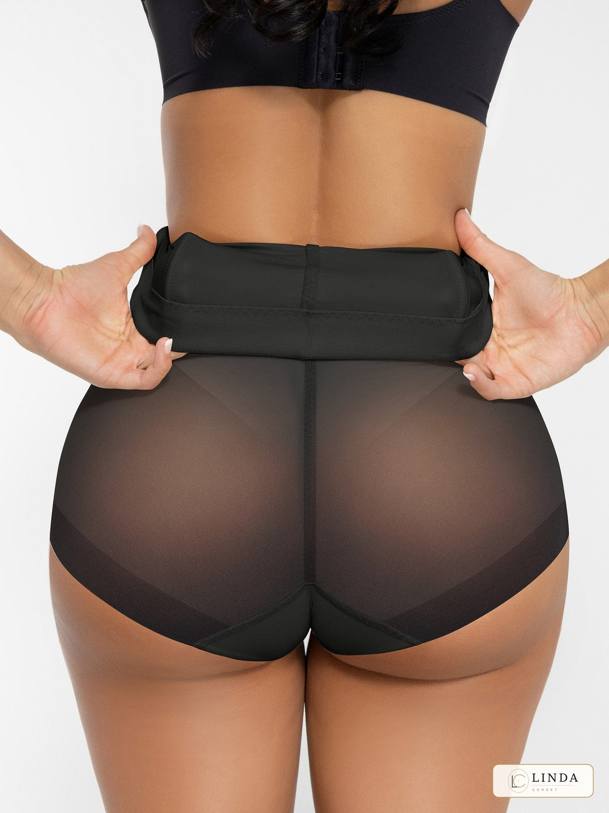 LINDA MeshSculpt black shaping brief, back view and flexible waistband