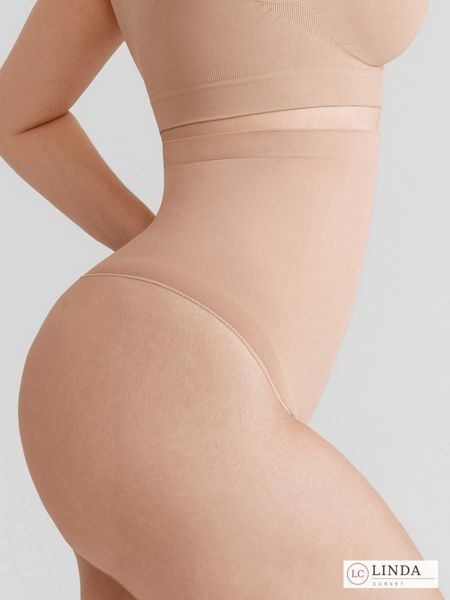 LINDA SilkSculpt seamless high-waist shaping thong — dark skin side closeup