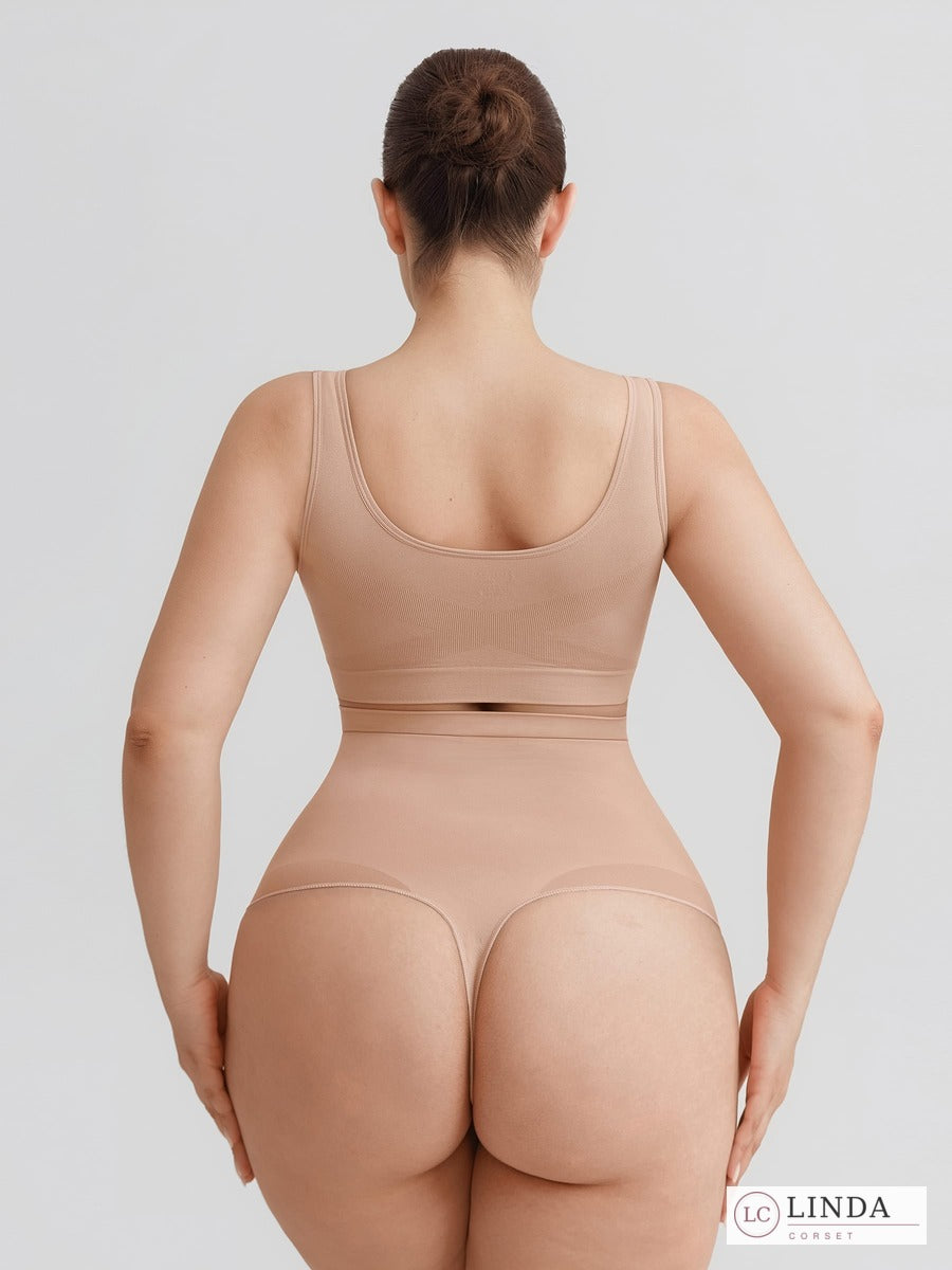 LINDA SilkSculpt seamless high-waist shaping thong — dark skin full back