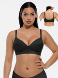Model wearing LINDA LunaLift black wireless demi push-up bra, front view