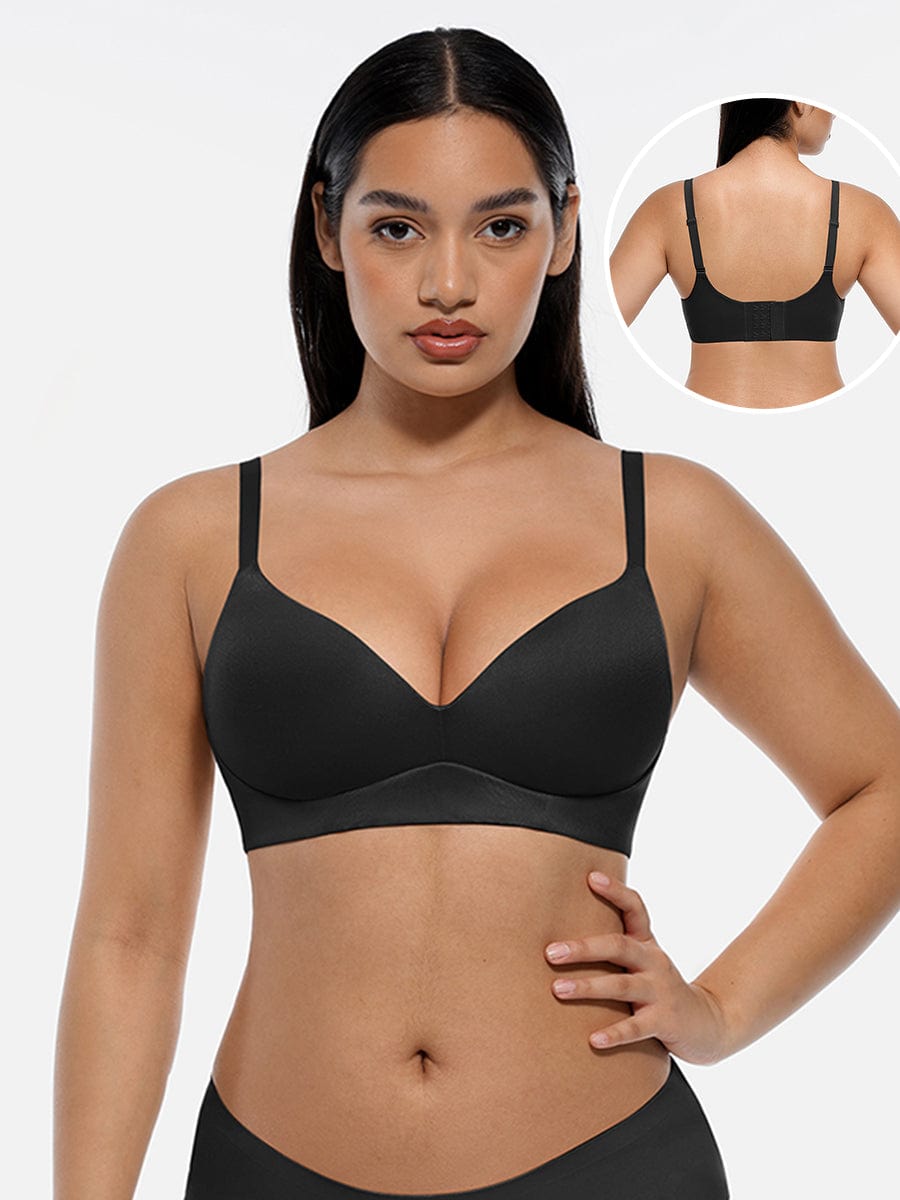 Model wearing LINDA LunaLift black wireless demi push-up bra, front view