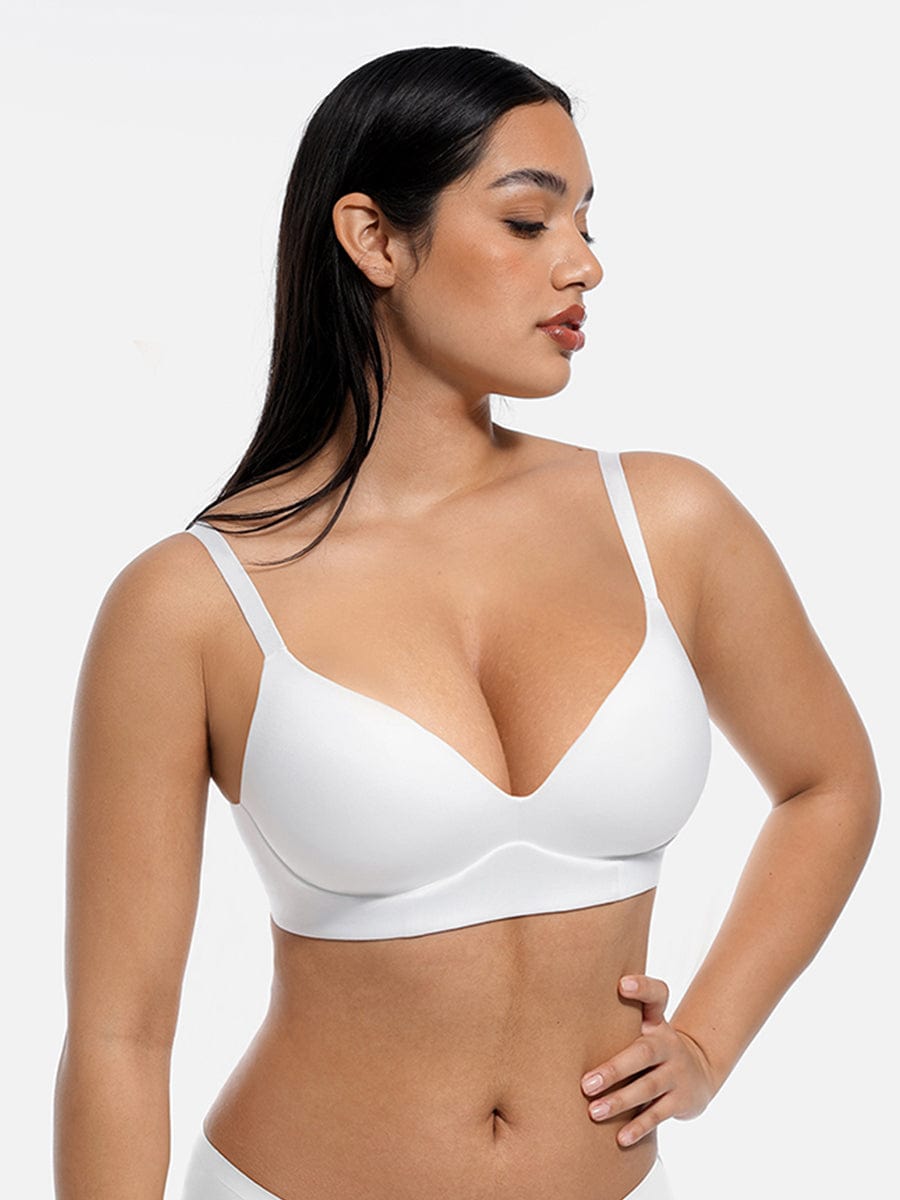 Model wearing LINDA LunaLift white wireless demi push-up bra, front view