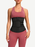 Front view of a model wearing the black LINDA PowerCurve 7-bone latex waist trainer