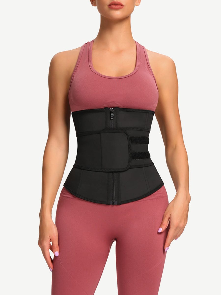 Front view of a model wearing the black LINDA PowerCurve 7-bone latex waist trainer